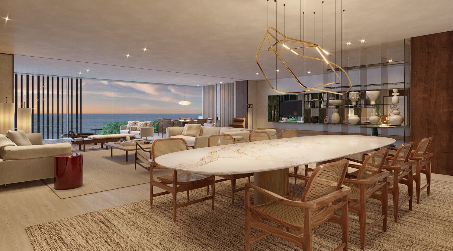 Sala de jantar com vista para o mar de uma unidade decorada do Bloco 1 do RIIO by Piero Lissoni